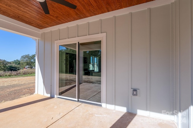 exterior space featuring ceiling fan