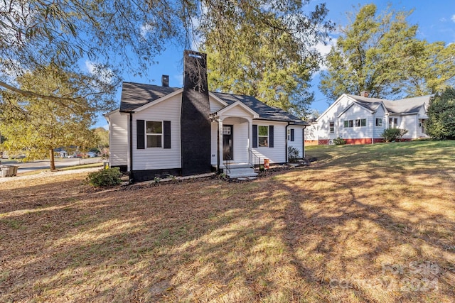 ranch-style house with a front yard