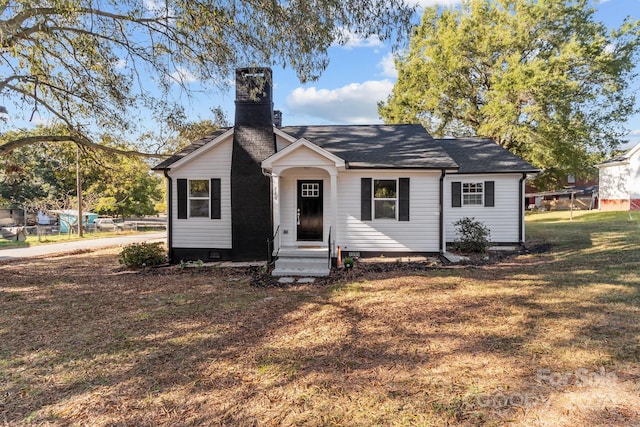 ranch-style house with a front yard