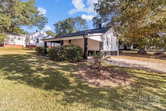 view of property exterior featuring a yard