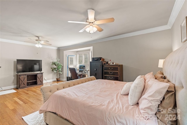 bedroom with ornamental molding, light wood-type flooring, and ceiling fan