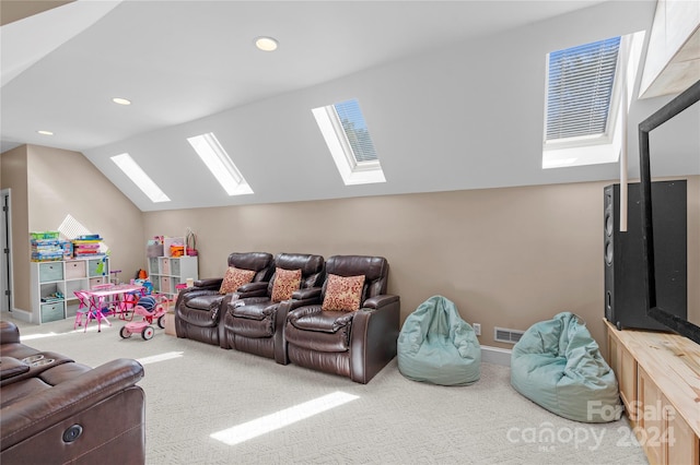 home theater featuring carpet flooring and lofted ceiling