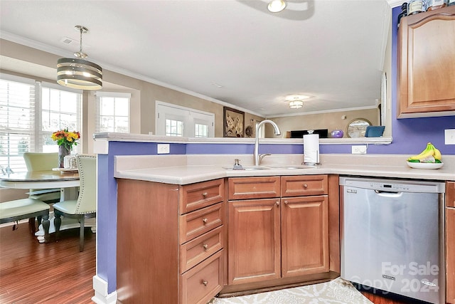 kitchen featuring ornamental molding, dishwasher, decorative light fixtures, and dark wood-type flooring