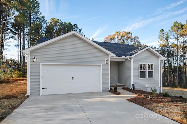 single story home featuring a garage