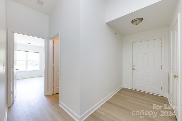 hallway featuring light wood-type flooring