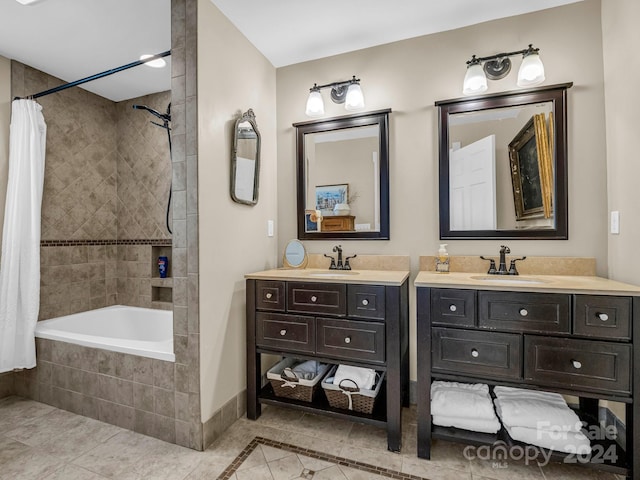 bathroom with tile patterned flooring, vanity, and shower / bath combo with shower curtain