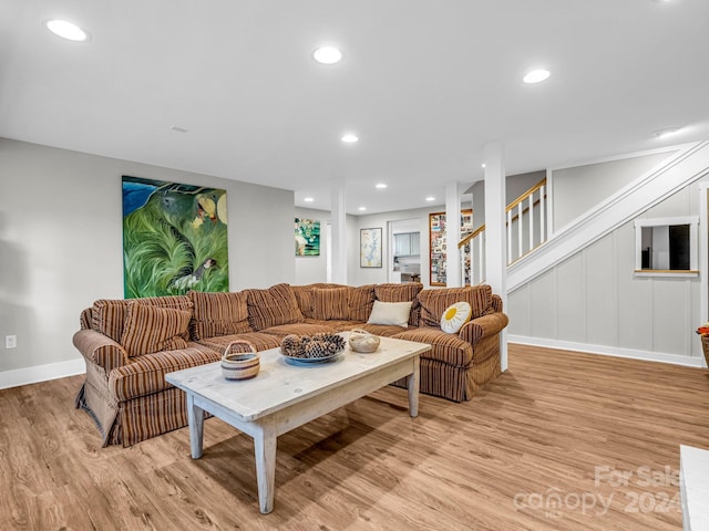 living room with light hardwood / wood-style floors