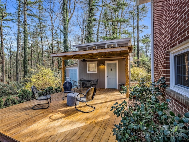 deck with a storage shed