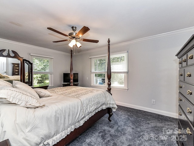 carpeted bedroom with ceiling fan, multiple windows, and ornamental molding