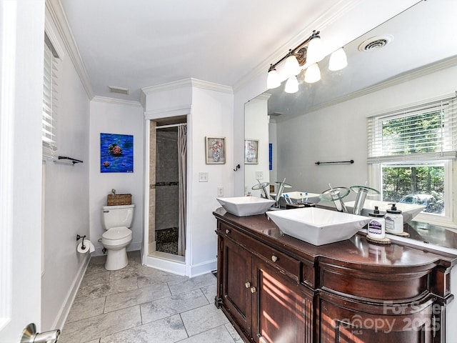 bathroom featuring curtained shower, toilet, vanity, and crown molding