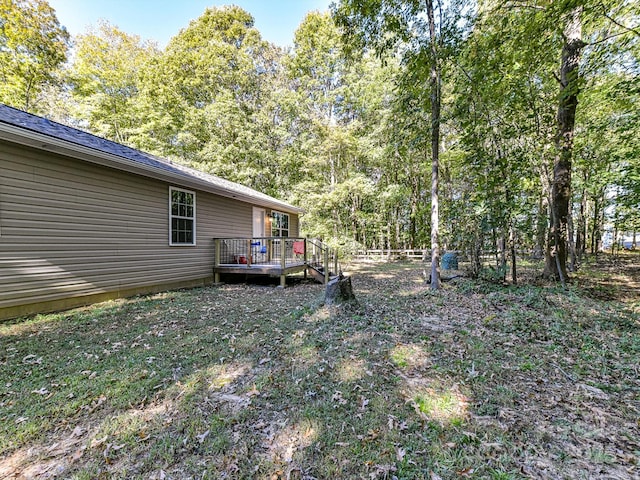 view of yard featuring a deck