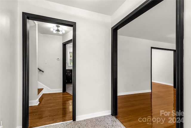 hallway featuring hardwood / wood-style floors