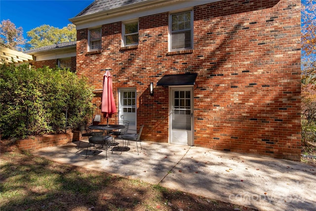 back of house featuring a patio