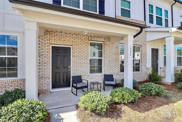 property entrance with covered porch