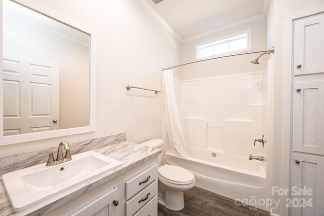 full bathroom featuring shower / bath combo, hardwood / wood-style floors, toilet, vanity, and ornamental molding