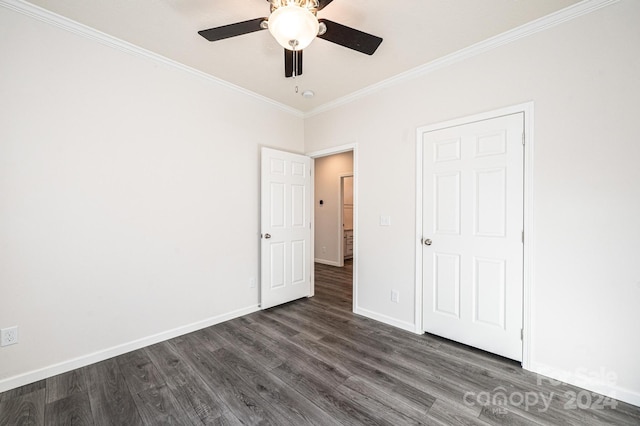 unfurnished bedroom with ceiling fan, crown molding, and dark wood-type flooring