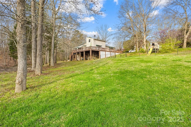 view of yard featuring a deck