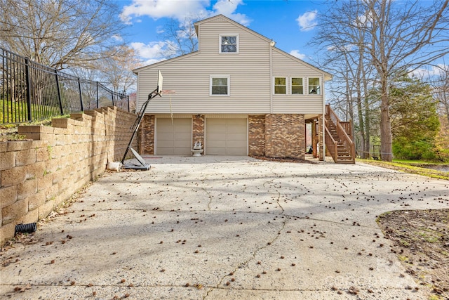 view of property exterior with a garage