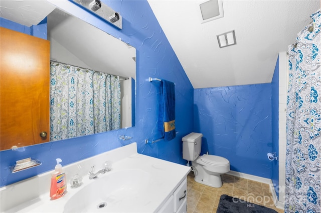 bathroom with vanity, a shower with curtain, vaulted ceiling, tile patterned floors, and toilet