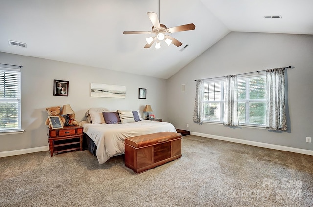 carpeted bedroom featuring high vaulted ceiling and ceiling fan