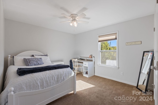 bedroom featuring ceiling fan and carpet floors