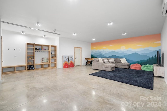 living room with concrete flooring