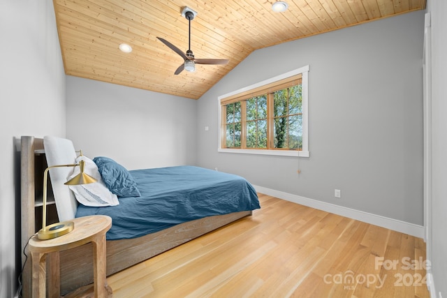 bedroom with wood ceiling, wood-type flooring, vaulted ceiling, and ceiling fan