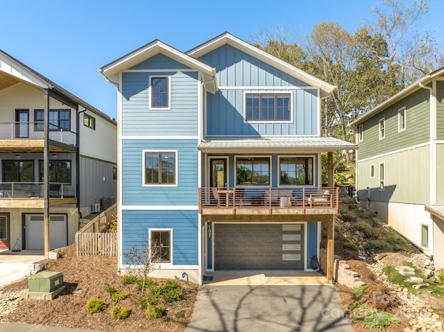 view of front of home with a garage and a balcony