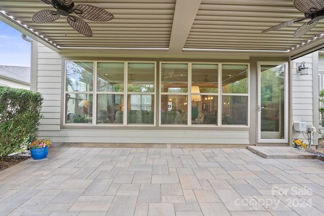 view of patio with ceiling fan