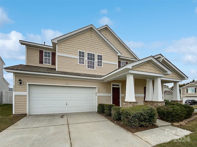 craftsman inspired home featuring a garage