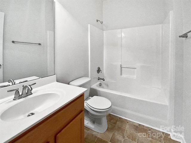 full bathroom featuring vanity, toilet, tile patterned floors, and shower / tub combination