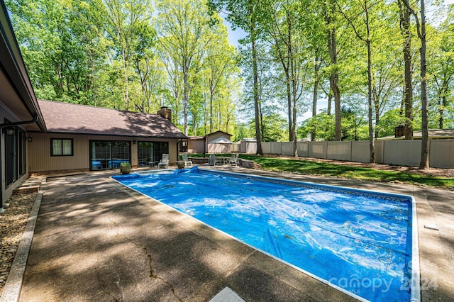 view of pool with a patio area