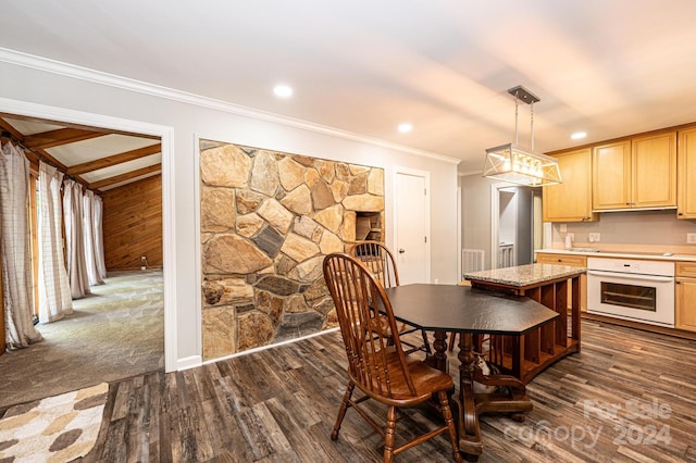 unfurnished dining area featuring crown molding and dark hardwood / wood-style floors