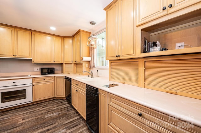 kitchen with dark hardwood / wood-style flooring, light brown cabinetry, black appliances, pendant lighting, and sink