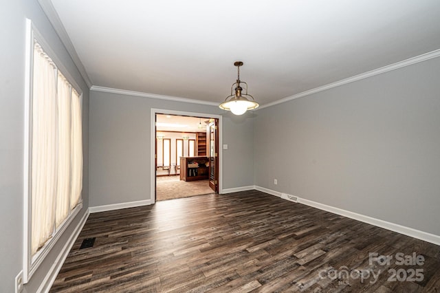 unfurnished dining area with ornamental molding and dark hardwood / wood-style flooring