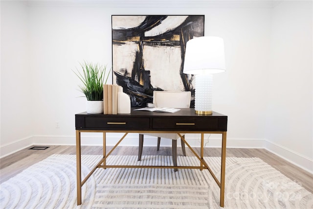 office area featuring hardwood / wood-style floors