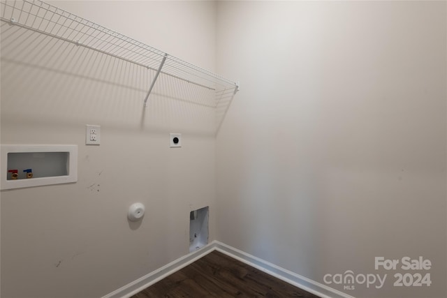 laundry area featuring washer hookup, hookup for an electric dryer, hardwood / wood-style floors, and hookup for a gas dryer