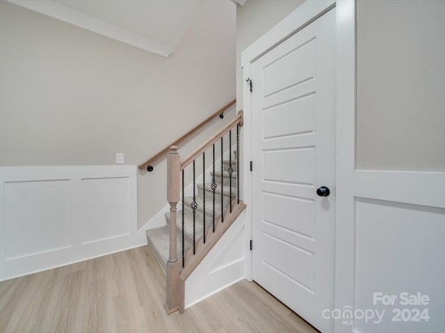 stairway with wood-type flooring