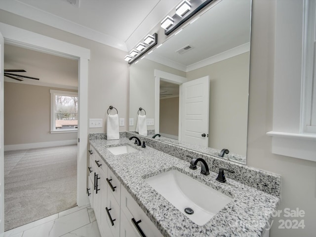 bathroom with vanity, ceiling fan, and crown molding