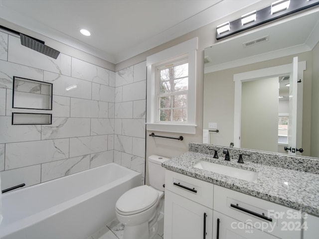 full bathroom featuring ornamental molding, vanity, toilet, and tiled shower / bath combo