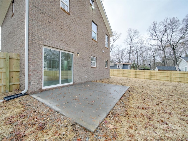 rear view of property with a patio