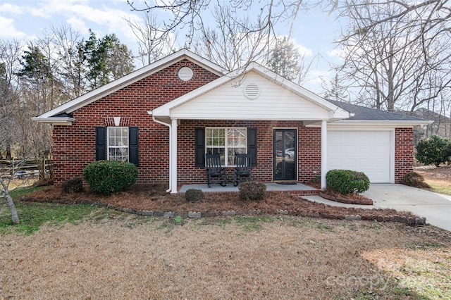 ranch-style home with covered porch and a garage