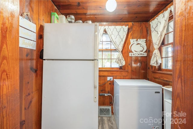 washroom featuring wood ceiling, wood-type flooring, and wood walls