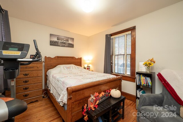 bedroom featuring hardwood / wood-style flooring