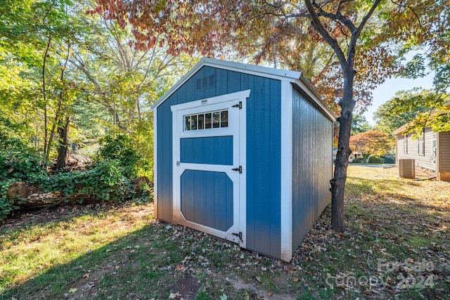 view of outbuilding with cooling unit