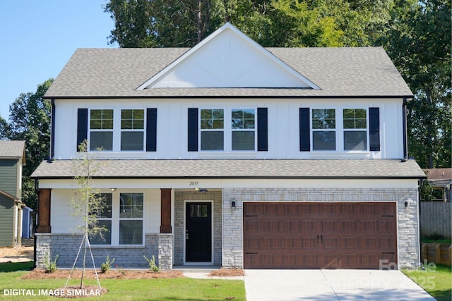 view of front of property featuring board and batten siding, roof with shingles, a porch, and an attached garage