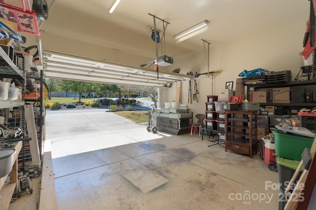 garage featuring a garage door opener