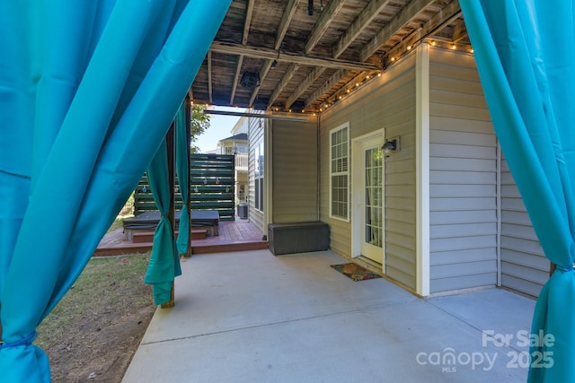 view of patio featuring a wooden deck