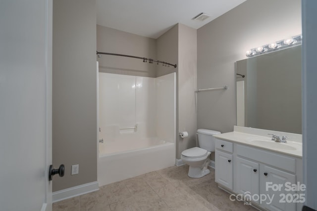 full bathroom featuring washtub / shower combination, vanity, toilet, and tile patterned floors