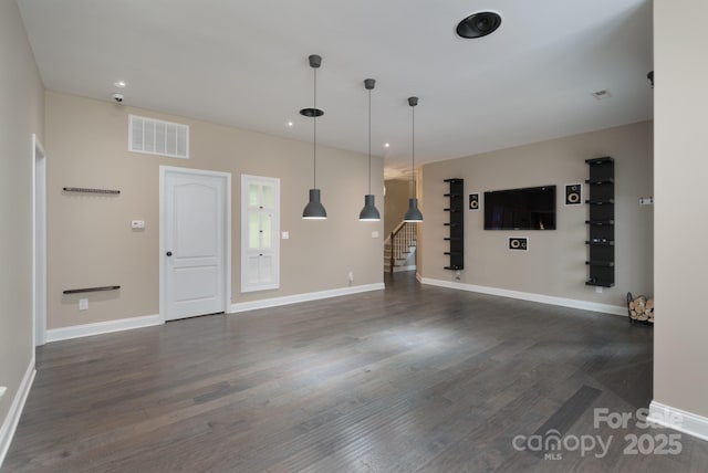 interior space with dark wood-type flooring